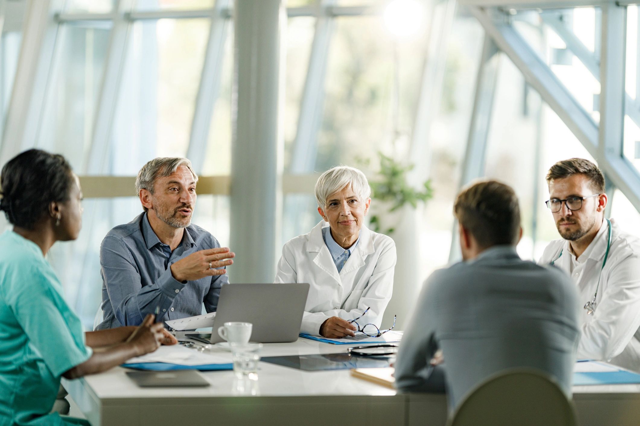 Clinical and business team meeting to discuss regenerative medicine solutions